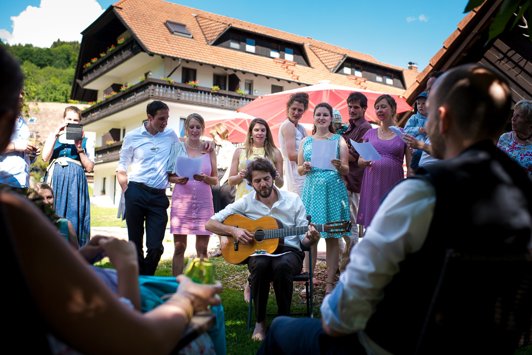 friends singing to bride and groom in germany